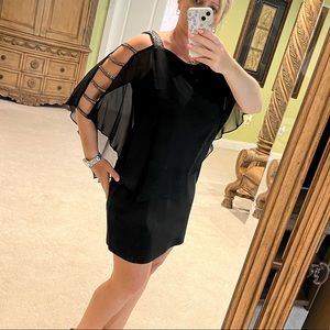 Black dress with sheer overlay